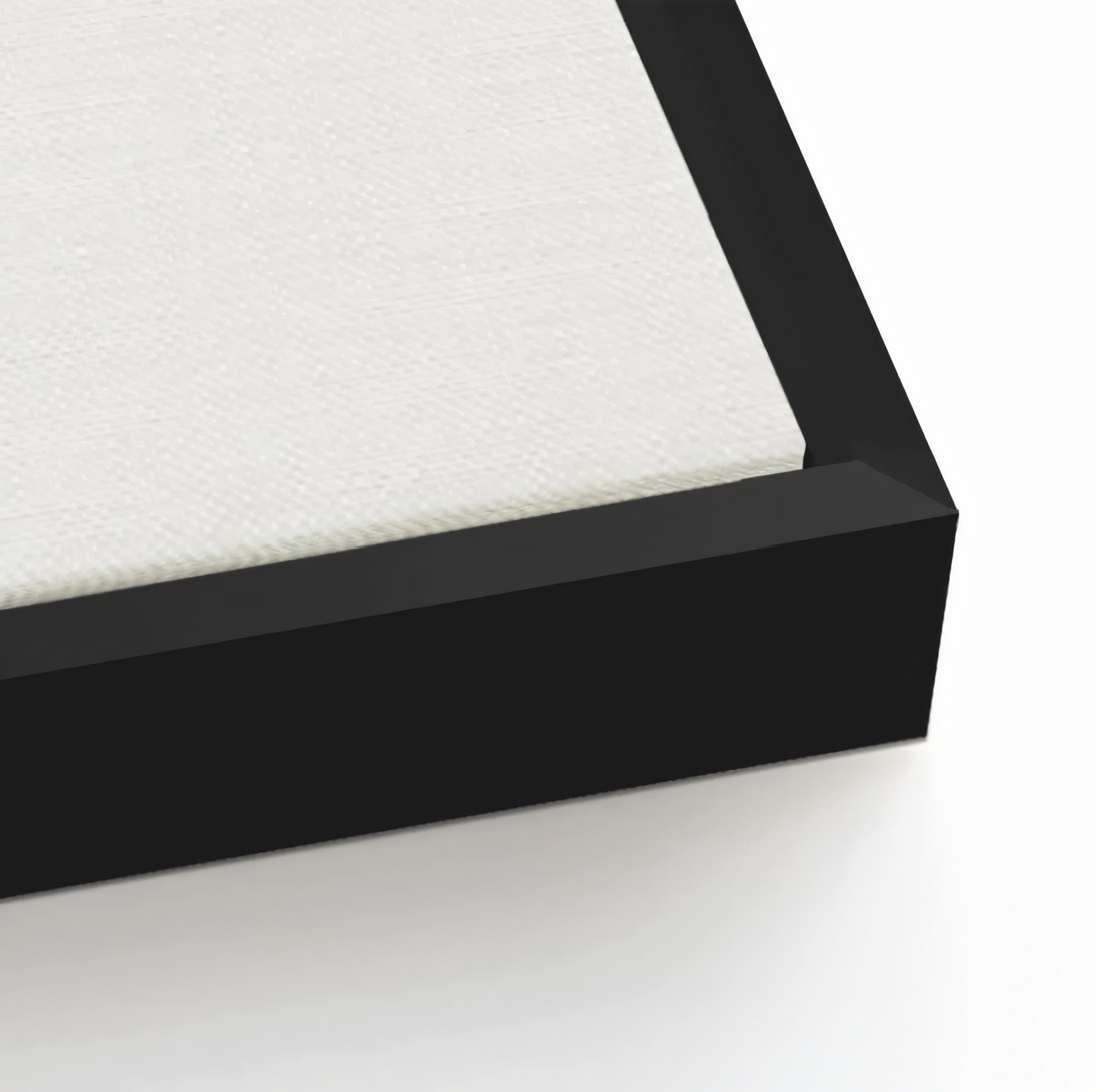 Close-up of an art canvas with black float frame option