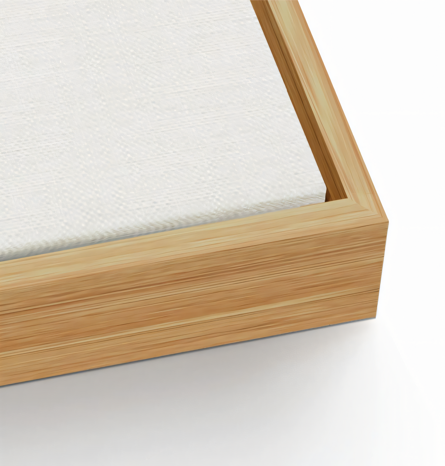 Close-up of an art canvas with oak float frame option